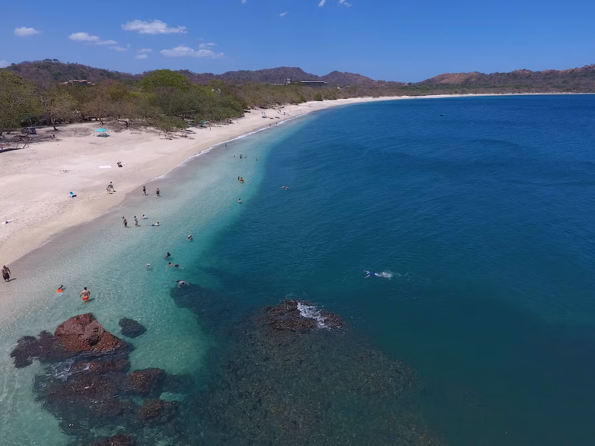 Playa Conchal from above, pale shell sand and clear water